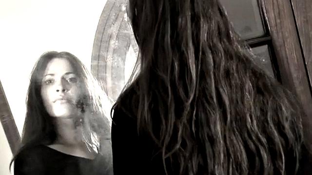 Leggy Nina does a striptease