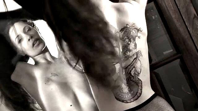 Leggy Nina does a striptease