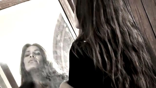 Leggy Nina does a striptease