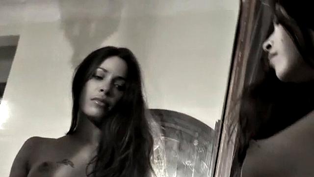 Leggy Nina does a striptease