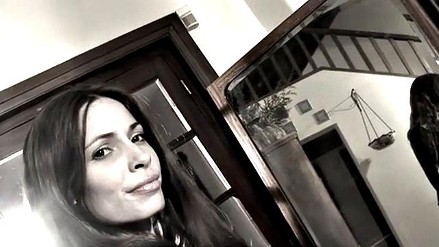 Leggy Nina does a striptease