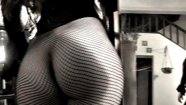 Leggy Nina does a striptease