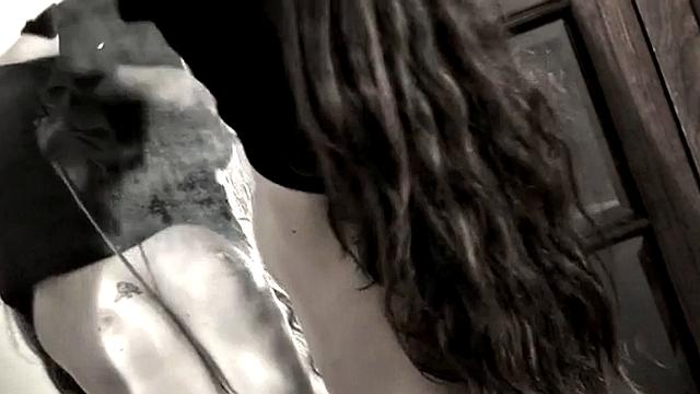 Leggy Nina does a striptease