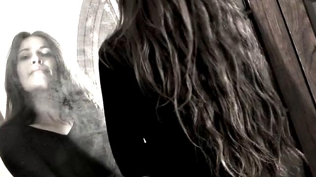 Leggy Nina does a striptease