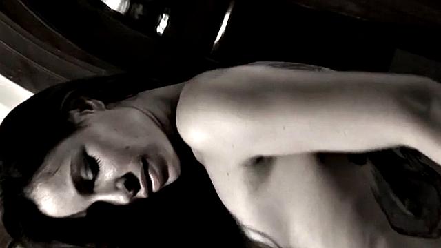 Leggy Nina does a striptease