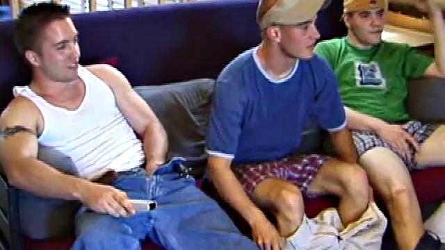 We find Tye and boy Collin perched on Tye's bed. Tye sees an opportunity to have some fun with his friend and goes for his cock, while the boy watches a porn video.