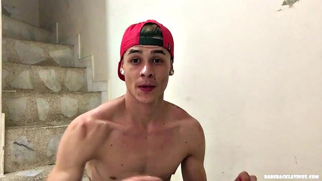 Dominic is a slim and smooth young man who is already stripped to his shorts when the video starts. He does some push ups and sit ups before stripping to his underwear.