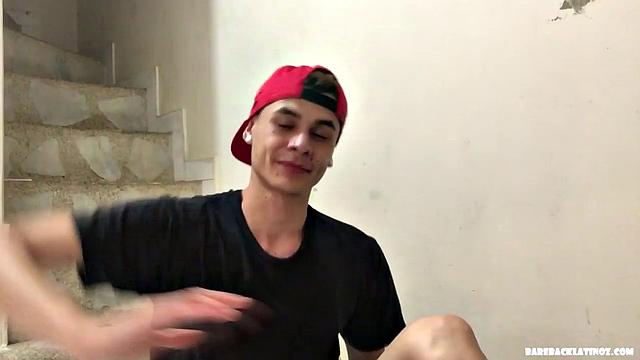 Dominic is a slim and smooth young man who is already stripped to his shorts when the video starts. He does some push ups and sit ups before stripping to his underwear.