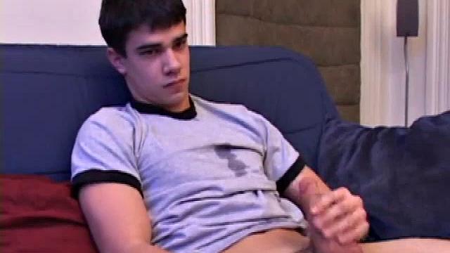 After unbuckling his jeans, Dawson slips them off and his hard cock pops out. He strokes it as he watches some porn