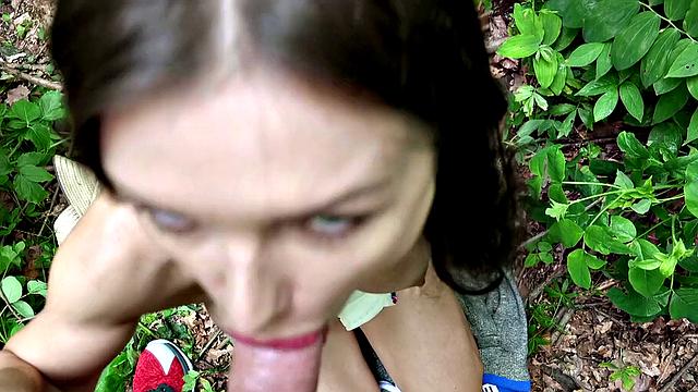 A Russian brunette get wild outdoors with handjobs and cowgirl