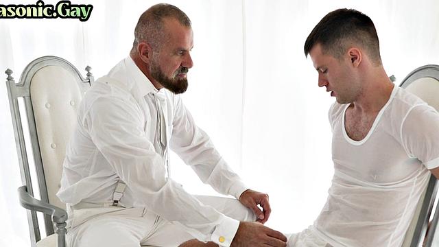 White suit mason toys twink ass while watching him jerk