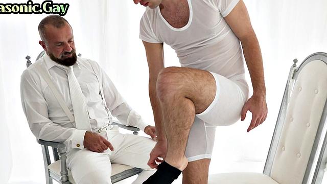 White suit mason toys twink ass while watching him jerk