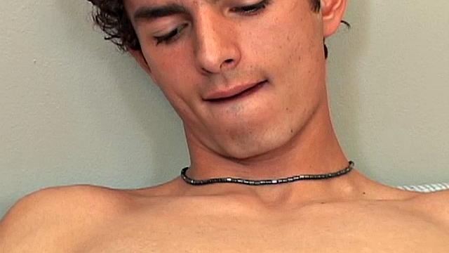 Armando is on the bed removing his clothes, ready to jack off with a front row seat.