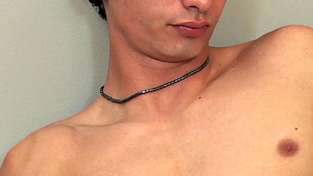 Armando is on the bed removing his clothes, ready to jack off with a front row seat.