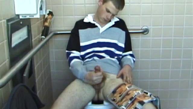 In the men's room, Christian unpacks a stack of porn magazines and flips through the pages, looking for the girl of the moment. Dropping pants, Christian gets into a firm jack off, made especially noisy by liberal lubrication.