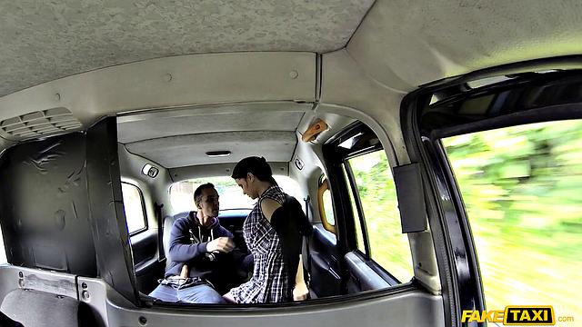 Tattooed couple fucks in the back of a cab while wearing thongs and skirt