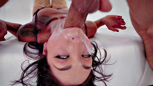 Petite tattooed babe in lingerie deepthroats cock