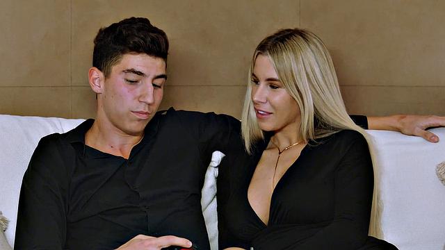 Miss Naughty flaunts her prowess while her wild wife blows her guest in the kitchen - an insatiable XXX scene!