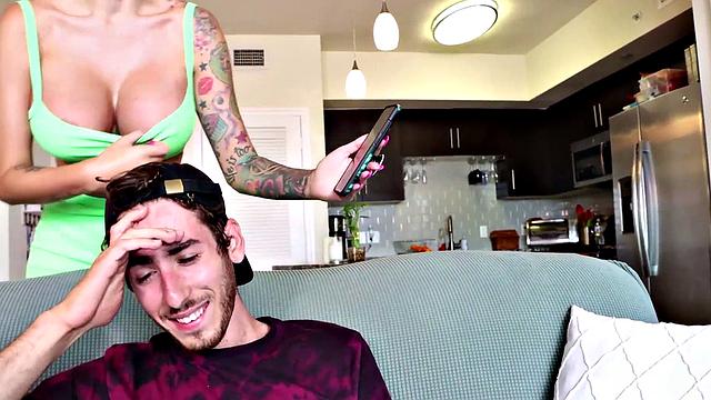 Boobylicious femdom MILF with tattoos jerks stud cock