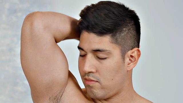 Solo athletic jock passionately stroking his cock