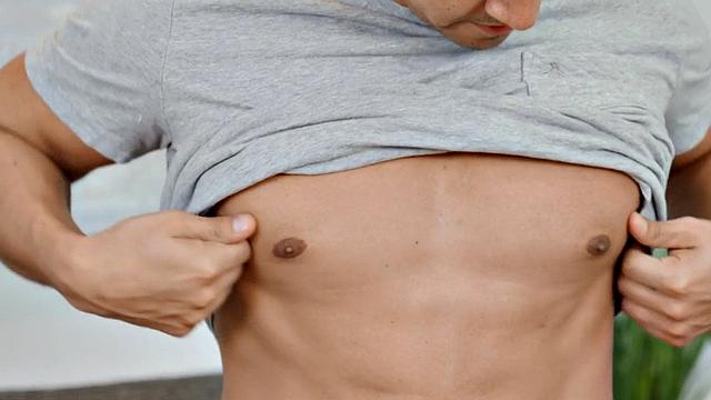 Solo athletic jock passionately stroking his cock