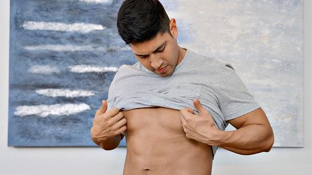 Solo athletic jock passionately stroking his cock