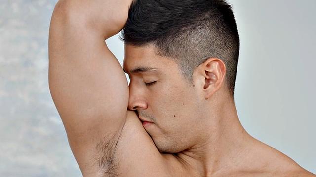 Solo athletic jock passionately stroking his cock