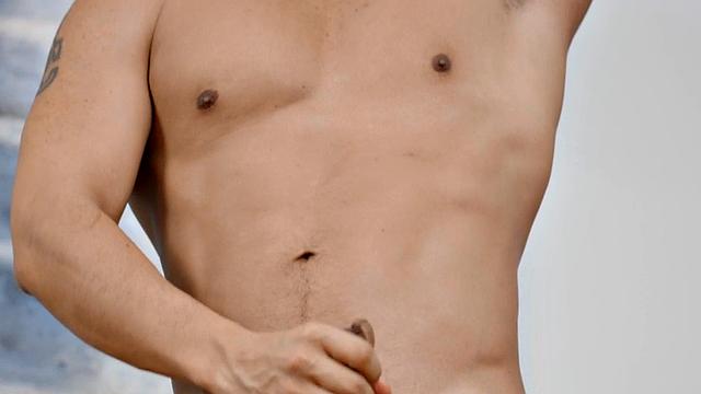 Solo athletic jock passionately stroking his cock