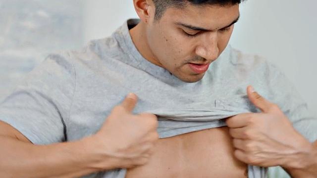 Solo athletic jock passionately stroking his cock