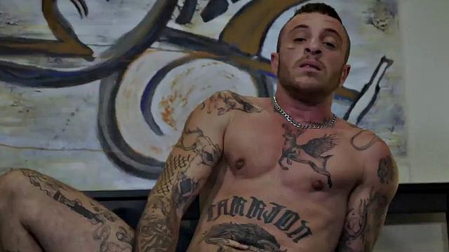 FTM tattooed operated masturbates with dildo