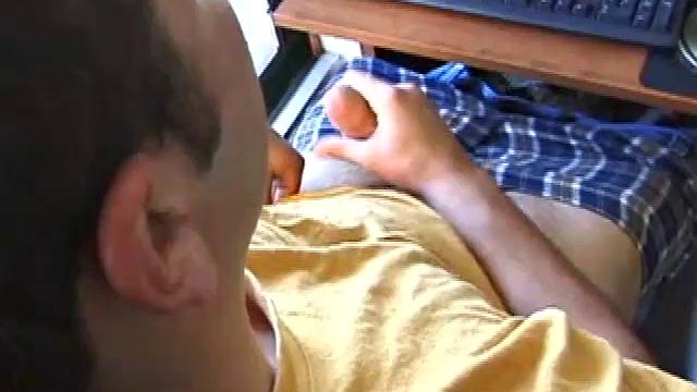 Tony strokes his hard cock alone