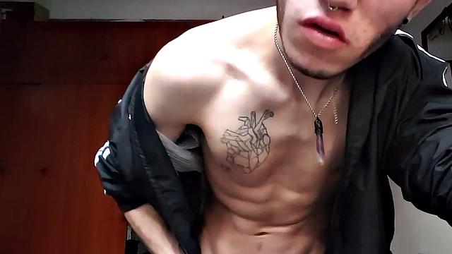 Pervert Boy bares it all for the cameras, showing off his inked body.