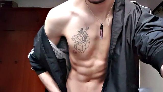 Pervert Boy bares it all for the cameras, showing off his inked body.