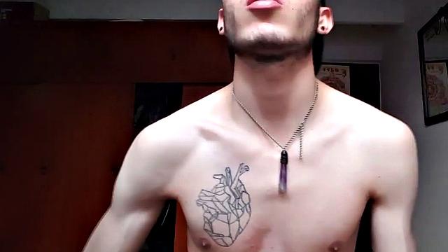 Pervert Boy bares it all for the cameras, showing off his inked body.