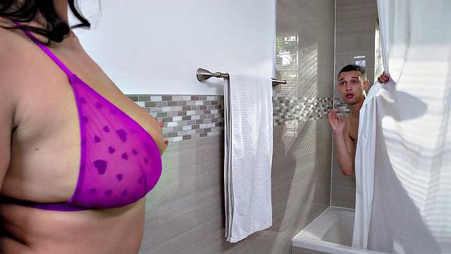 Stepmom in high heels deepthroats stepson's hard cock in the living room