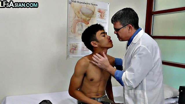 Mature gay doctor fucks Asian twink in his infirmary