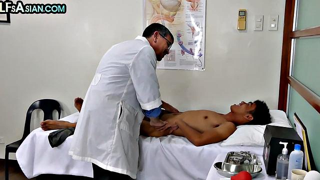 Mature gay doctor fucks Asian twink in his infirmary