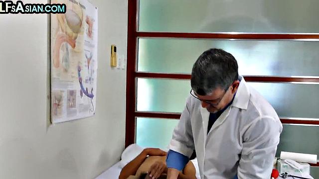 Mature gay doctor fucks Asian twink in his infirmary