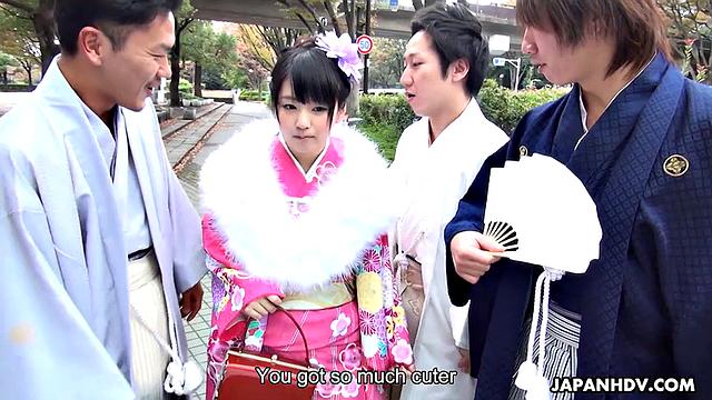 Kimono lady Tsuna Kimura is with three men