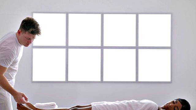 Sensual ebony making love on massage