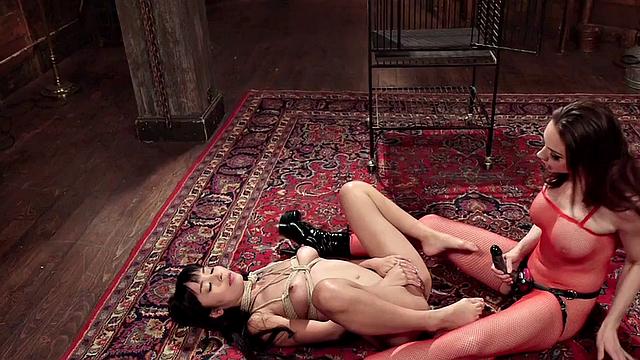 Whipping busty lezdom fucks Asian with strapon