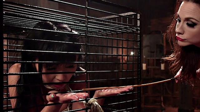 Whipping busty lezdom fucks Asian with strapon