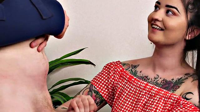 CFNM tattooed teen gives a sloppy handjob before taking a cumshot