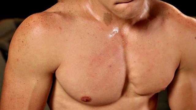 A muscular amateur babe stroke his huge dick in the living room