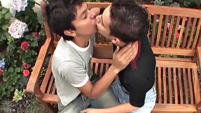 A garden bench makes the perfect platform for these skinny Latin boys to get naked and get it on. The two enjoy sucking on each other's big uncut dicks, before ass rimming turns to fucking.