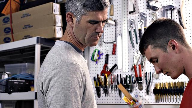 Watch this dominant dad take control and fuck his eager son at the workbench