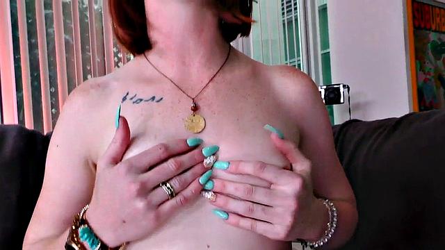 Manojob redhead jerks POV oiled cock while talking dirty 