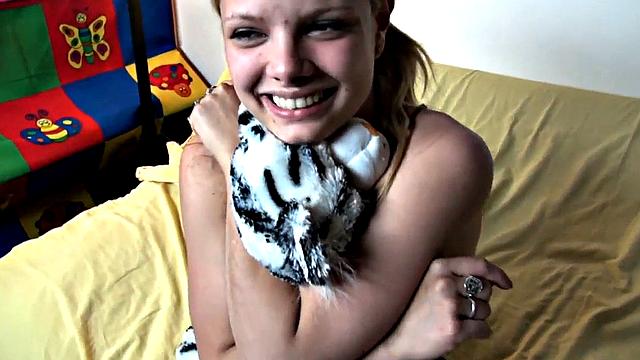 Blonde teen's bald pussy gets stretched in solo playtime with socks and ponytails