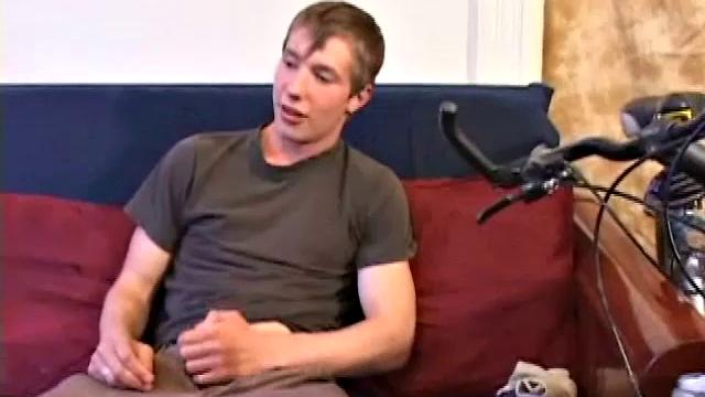 Andrew Patterson plays with his big cock before getting naked and stroking it with lube