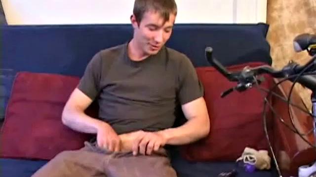 Andrew Patterson plays with his big cock before getting naked and stroking it with lube